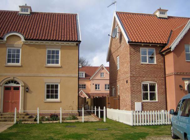 5TwoHomes.jpg - Currently there are 27 homes in the Maharishi Garden Village in England.