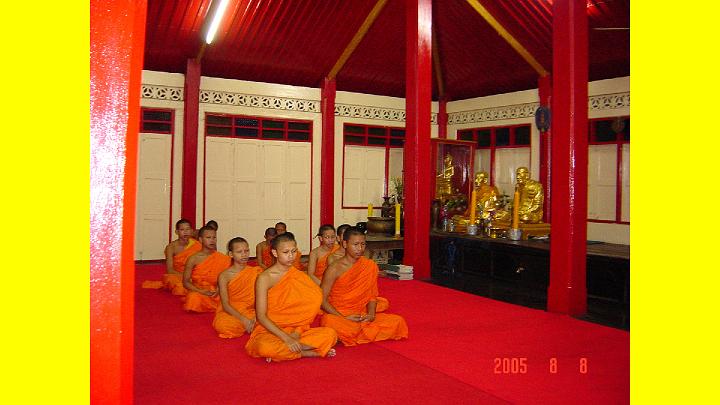 018checking.jpg - Younger monks in the Temple of the Sun are seen here meditating as a group.