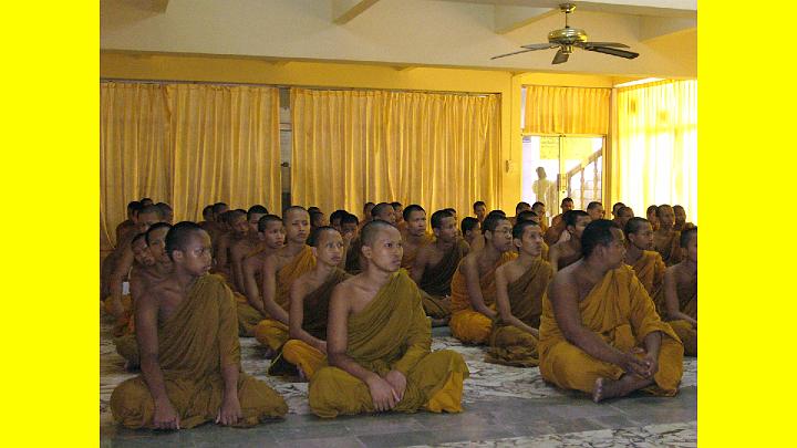 031.jpg - Younger Buddhist monk students listen to a lecture after learning the practice of Transcendental Meditation.