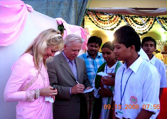 73.jpg - Dr Alarik and Cynthia Arenander give autographs after the presentation at Maharishi Vidya Mandir National Cultural Meet in Maharishi Centre for Educational Excellence, Bhopal, India.
