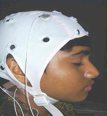 75.jpg - A student subject on stage practising Transcendental Meditation in a live EEG demonstration during the Maharishi Vidya Mandir National Cultural Meet in Maharishi Centre for Educational Excellence, Bhopal, India.