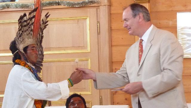 P1010752.jpg - Traditional Rulers from the Amazon visited the International Capital of the Global Country of World Peace in MERU, Holland and in this photo presented a flower from Greenland, where they had recently stopped, to Dr Christopher Crowell, Minister of Religion and Culture of the Global Country of World Peace who hosted Traditional Leaders from the Amazon and gave a beautiful overview of the World Federation of Traditional Kings.