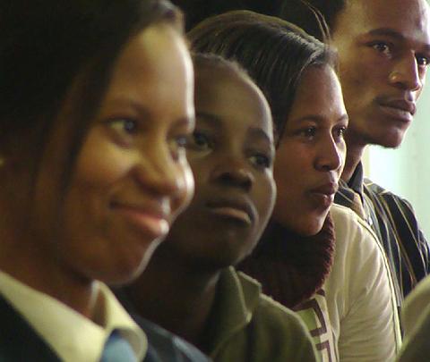 9.jpg - Students listen to a lecture. The unique educational model which includes ongoing stress management through daily practice of Transcendental Meditation and its advanced techniques, results in unrivalled customer service, massive training, and development for the industry, and the lowest staff turnover in a solution that helps thousands of deserving young South Africans access education and skills development.