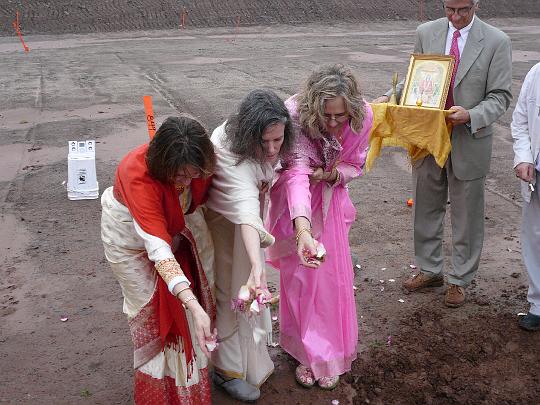 003.JPG - 15 March 2009Dr Susie Potter, Dr Maggie Sands, and Dr Colleen Rosania spread flower petals in the cornerstone ceremony.
