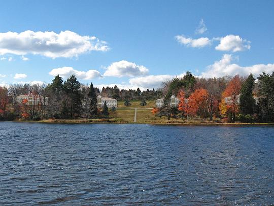 004B.jpg - 15 March 2009Beautiful residences and gleaming Maharishi Peace Palaces nestled in the woods as seen from across Lake Shandelee.