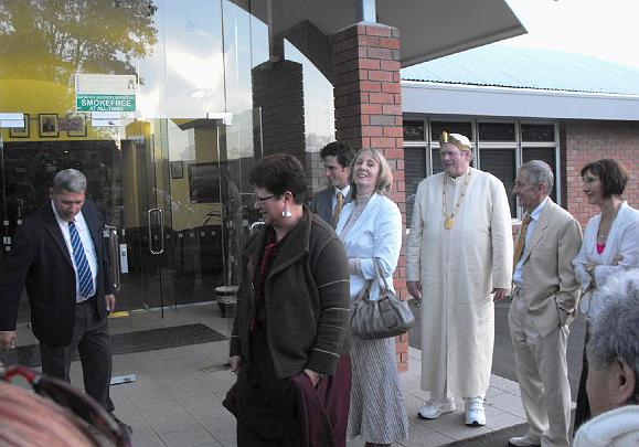 05DSCF0013.jpg - May 2009Raja Wynne and members of the Global Country of World Peace are greeted by the principal at the main entrance of the secondary school in Northland, New Zealand.