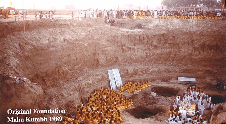 Slide32.jpg - At the Maha Kumbh of 1989, Maharish met with Vedic Pandits and leaders and performed puja (auspicious ceremony) in the original foundation of the Maharishi Samadhi Smarak now under construction.