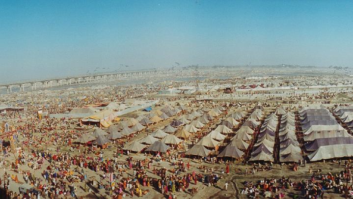 Slide51.jpg - Over 10 million pilgrims attend Kumbh Mela at the Triveni Sangam each year, and will soon be able to marvel at this architectural milestone commemorating Maharishi's supreme knowledge. This will help support the 1500 pandits at the neighbouring Brahmananda Saraswati Nagar.