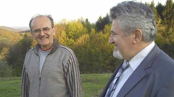 40-661591680.jpg - Anjelko, the National Director of Bosnia-Herzegovina and Dragutin Micanovic on the beautiful, fertile, and perfectly sloping land owned by the Transcendental Meditation Movement in Banja Luka (Bosnia-Herzegovina).