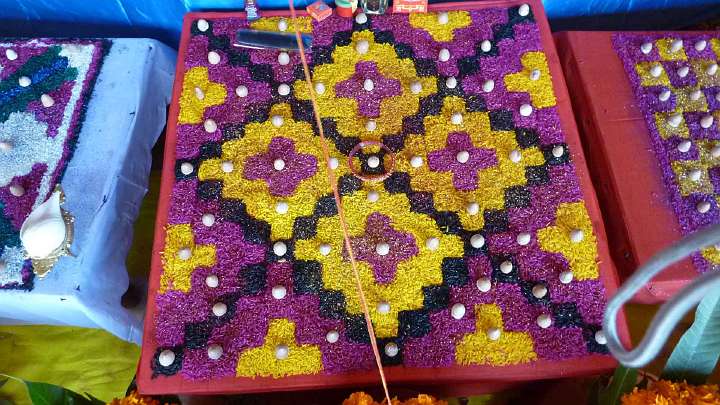 040.jpg - Traditional designs for the Navaratri celebrations are made out of foodstuffs like rice to signify beauty and abundance.