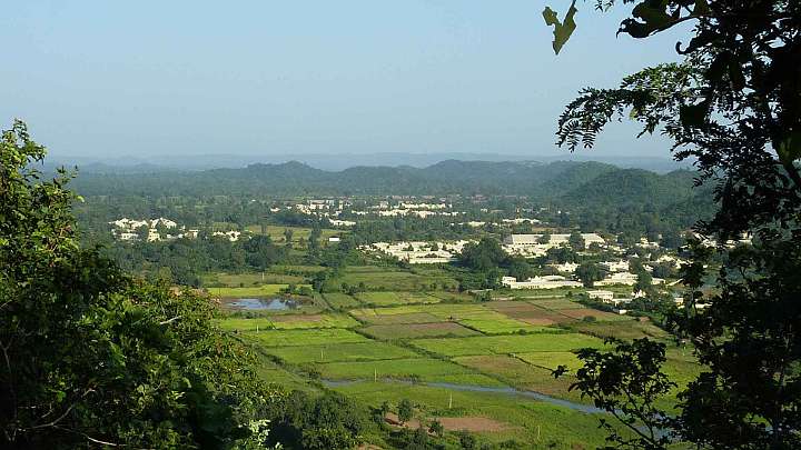 070.jpg - Looking east over green fields at the Global Country of World Peace in the Brahmasthan of India.
