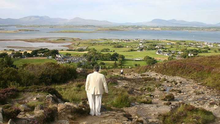 22c-from-Crough-Patrick.jpg - Dr Morris enjoys the spectacular view from the Maharishi Island of World Peace. There are plans to have a group of Maharishi Vedic Pandits who will create peace and coherence through their Vedic Performances.