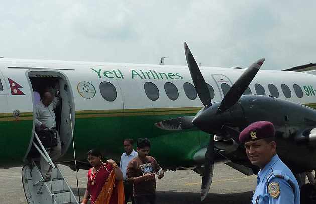 37.jpg - Boarding plane to Janakpur, in the southern plains of Nepal, to explore possibilities for Vedic organic agriculture.