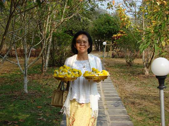 Greeting.jpg - The director of the facility in Chantaburi prepares to greet the Maharishi School of the Age of Enlightenment students from Fairfield, Iowa, USA.