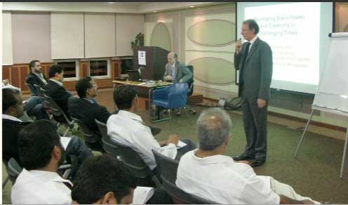 Picture-5.jpg - 22 January 2010Dr Travis (seated) and  Dr Chris Higgins, then president of the Manchester Business School branch in Dubai Knowledge Village, lecture on the Transcendental Meditation Programme, consciousness and ideal brain functioning.