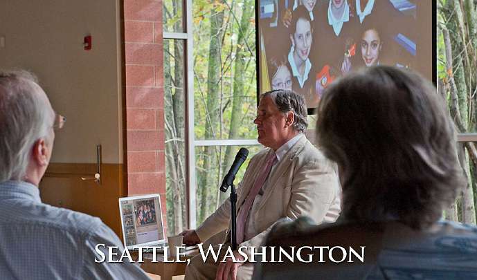 09-Seattle3.jpg - In Seattle, showing slides of Maharishi Schools throughout the world.