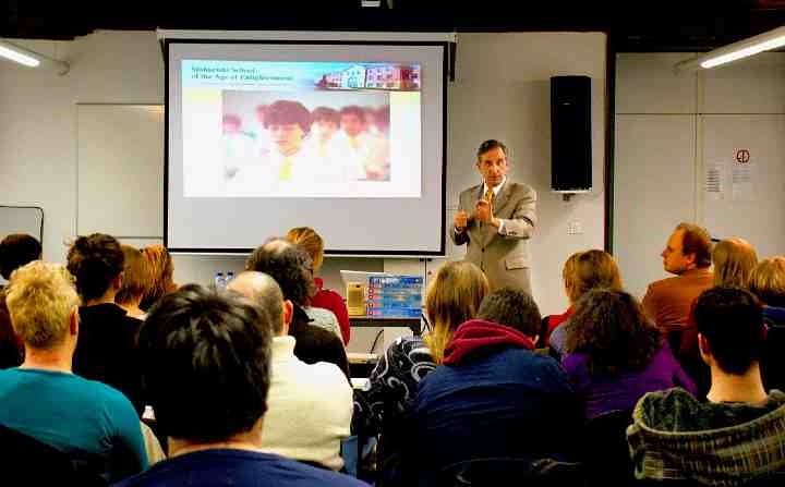 02-Leuven-2.jpg - Dr Ashley Deans, speaking in Leuven, explained the benefits of Consciousness-Based Education. to the audience and outlined for them how it works in a school.