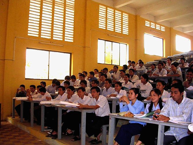 slide3A.jpg - Students attending management lecture in main lecture hall.