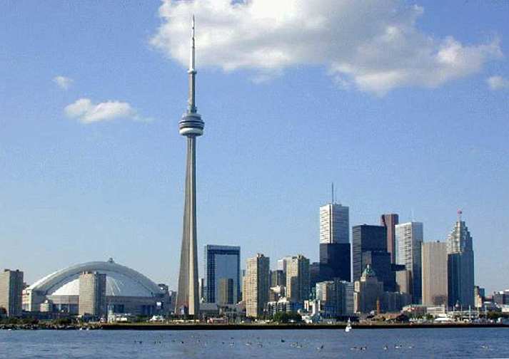 031--toronto-skyline.jpg - The Invincibility Centre in Toronto, directed by Dr David Shaw, purchased the Brainmaster machine. Initially over 100 people saw a demonstration during a tour by Dr Travis. Individuals at the demonstration practicing Transcendental Meditation while connected to the machine were pleased to be able to validate their experience in front of their non-meditating friends and family.