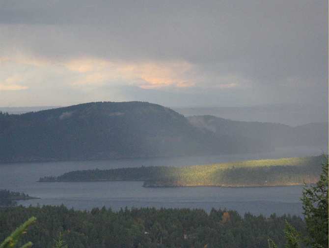 045-Aubrey-WP-House-view.jpg - View seen by the group in previous photo on Salt Spring Island. The island's beauty and fresh, relaxed atmosphere add to the benefits of various courses in Maharishi?s Programmes offered on the island.