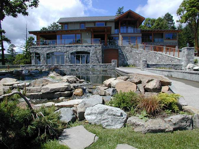 016Cedar-and-stone.jpg - This 11,000 square foot (1,022 square metre) Maharishi Vastu home, constructed of local stone and cedar, is situated on a 55-acre (22 hectare) estate in one of the Maharishi Vastu communities on Salt Spring Island.