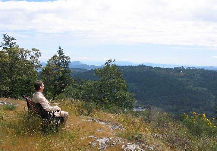 022Raja-Paul-at-ArmWay.jpg - Dr Paul Potter took in the views of Armand Way, a new Maharishi Sthapatya Veda (MSV) development still in the design stages. The homes will all be designed and built according to the principles of Maharishi Vedic Architecture, an ancient system of design and construction based on natural law.