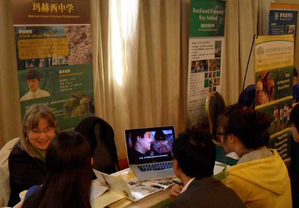 03China.jpg - The Maharishi School presentation began with what most interested students and their families: the achievements of MSAE students and testimonials from Chinese students at MSAE. Parents and students had lively discussions about the unique, low-stress environment of the Maharishi school campus.