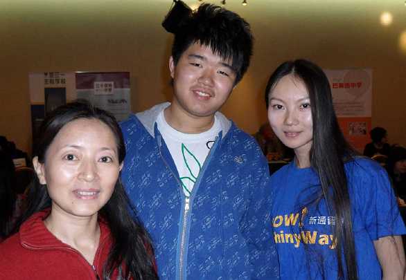 09China.jpg - Chinese student with his mother and the  translator to right.