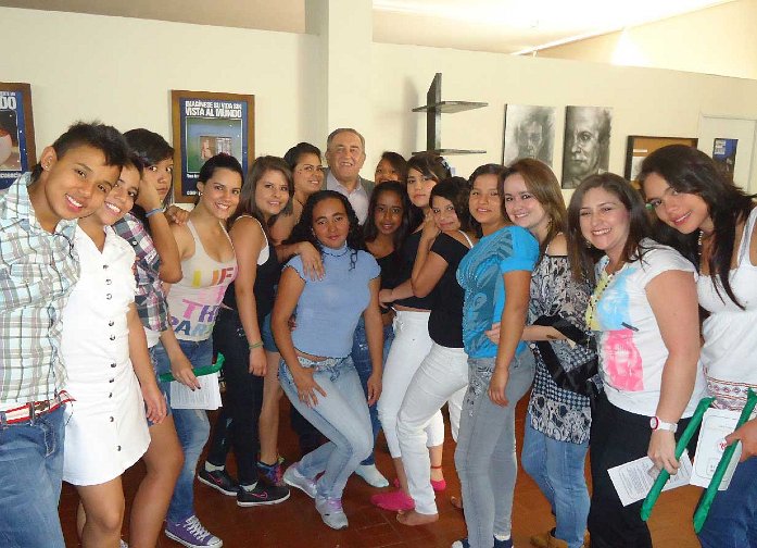 35_Columbia.jpg - 7 August 2012Girls of Hogares Claret who have recently graduated from the Transcendental Meditation-Sidhi course pose happily with Father Gabriel Mejia, centre.