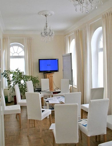 Slide15.jpg - The British group marvelled at the thoroughness and precision in planning every room to be utilitarian and at the same time tastefully designed and outfitted. This smaller lecture hall/conference room is equipped with the latest technology for making presentations.