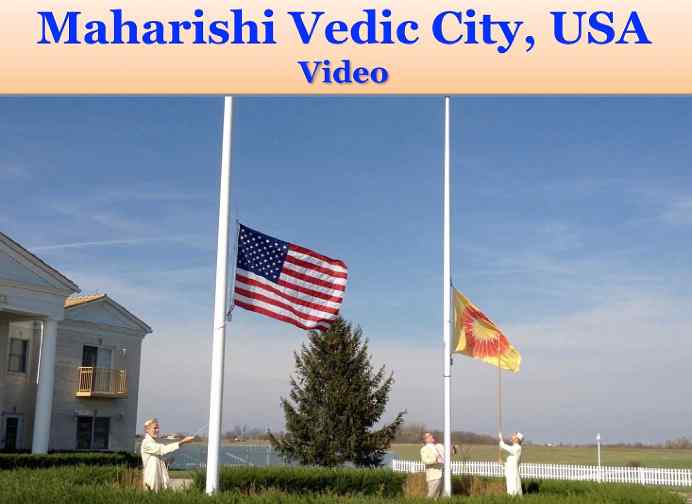 USAmvc.jpg - USA: Dr bevan Morris, centre, raised the Flag of Invincibility in Maharishi Vedic City, Iowa, during one of the many celebrations for Victory Day in Invincibility Centres all over the country.