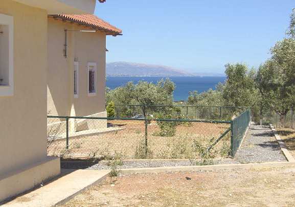 18_Greece_03.jpg - The beautiful view from the east of the Vastu in Avlida, towards the Agean Sea. The establishment of GMDO in Greece took place in July, 2010. A special Guru Purnima celebration was held on behalf of the newly established Global Mother Divine Organization.