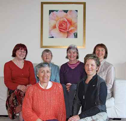 08_NewZealand_02.jpg - Members of the Global Mother Divine Organization meet together for one of the monthly full moon celebrations at the Vastu home, built according to the principles of Maharishi Sthapatya Veda, of GMDO Co-director Carolyn Rhodes (top right).