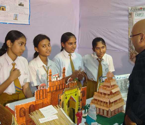 02_India_24.jpg - Students explain an array of exhibits in the ?Explore 2010? Knowledge Fair.