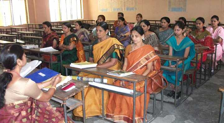 India_14.jpg - 3 July 2012 reportHyderabad: Graduates of the Consciousness-Based Education seminar have been training their fellow teachers and lecturers, who will begin teaching the secondary school level Science of Creative Intelligence Course to their students on a weekly basis. A group meditation is pictured before class begins.