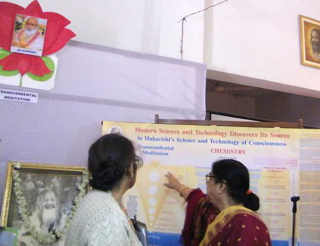 India_38.jpg - 3 July 2012 reportKolkata: Educators explain points in the Unified Field Chart displayed at the 'Explore 2012' exhibition.