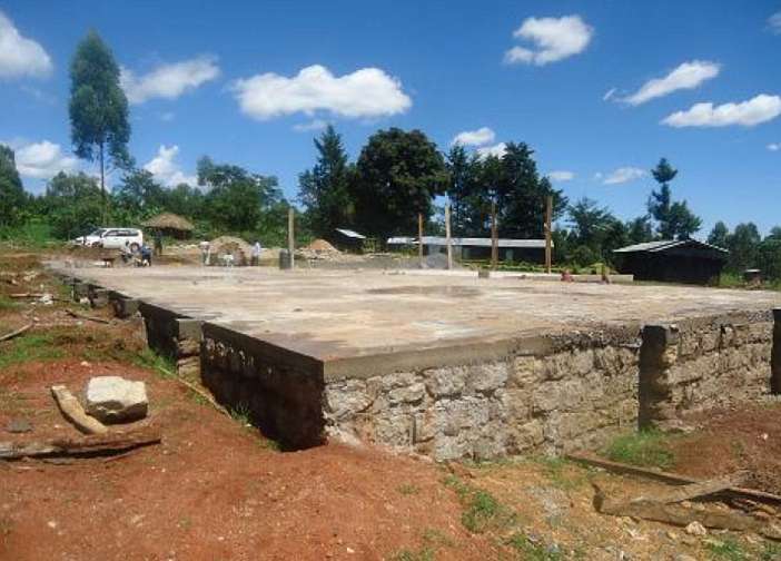 kenya12.jpg - In the sturdy concrete slab foundation we can see a clear reflection of the traditional proverb, 'Well begun is half done?.