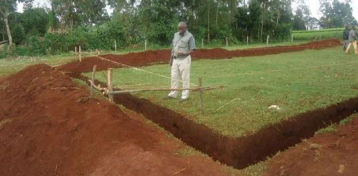 kenya3.jpg - The plot chosen for the building is positioned according to the principles of Maharishi Vastu. A deep trench has been dug for the  foundation of the 3,300 square foot (300sm) community hall.