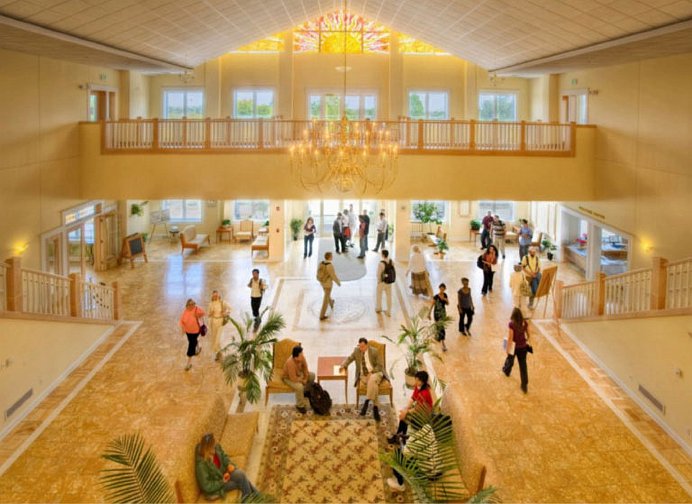 05_Bevan.jpg - Students enjoy the magnificent lobby of the Argiro Student Center. The building includes a meeting hall with 400 capacity, student caf�, lounge, student store, festival hall, industrial-sized kitchen, dining halls, boardroom, and classroom. It has the only university dining hall that serves vegetarian organic food that the university president knows of.