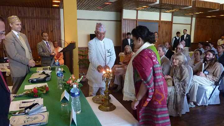 07.jpg - Madam Vice President of Nepal lit the lamp and gave a beautiful inaugural address to the large delegation of governmental officials and representatives of organic agriculture companies. She explained that organic agriculture is the only way to have pure foods, and safeguard the health of the people and the future of the country. At her side is Dr Deepak Baskota, National Director of Nepal.