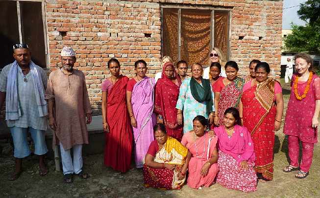 41.jpg - Ladies of the village cooked a delicious meal for the guests. The community is very interested in expanding organic agriculture for the area.