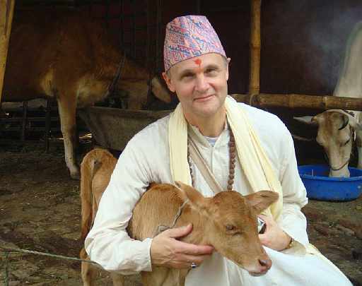 58.jpg - Raja Kingsley with newborn calf.