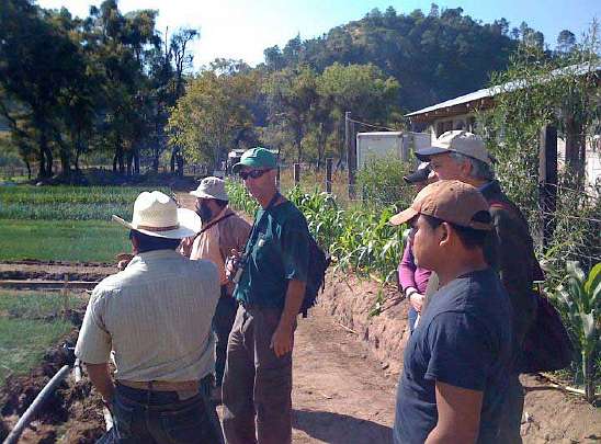 20-Meeting-Farmers.jpg - Dr Kenneth Boyum (please see slide 18) and Raja  Wynne met with farmers and market sellers. They were enthusiastic towards Dr Boyum?s proposals regarding production rates, the importance of maintaining organic growing, and pricing.