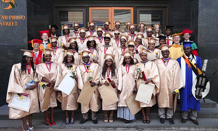 127_Bevan.jpg - The first graduates of Maharishi Invincible Institute in Johannesburg, December 2013. They started without or this building and rose to obtain good jobs in major corporations?an  amazing accomplishment to them and their families.