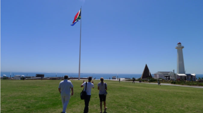 CapeAngulhas00.jpg - Dr Morris took a tour of Port Elizabeth, on the South Eastern coast of South Africa. The South African flag flies from the top of the hill above Nelson Mandela Bay.