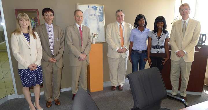 SouthAfrica090.jpg - One focal point of Dr Morris's first days in South Africa was a visit to the Maharishi Institute (MI), an innovative and highly successful institution of higher education that was created in 2007. Hosted by MI founder Dr Taddy Blecher (second from left) and co-director Dr Richard Peycke (third from left), Dr Morris toured the large facility and met with several groups of students.