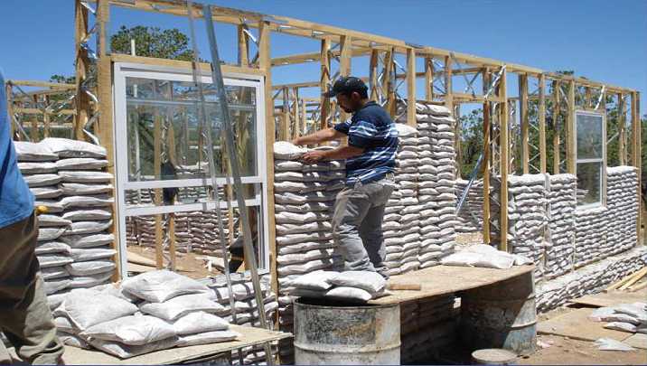 Slide02.jpg - 25 April 2010The inventor of sandbag building in South Africa was invited to an organic agricultural project in the Ukraine where a low cost, quick and ecological building system was needed.