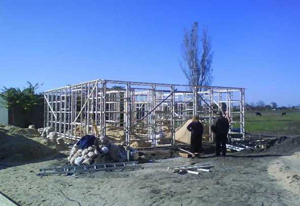 Slide10.jpg - The framework is post and beam; and is assembled in a few hours.