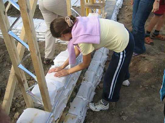 Slide12.jpg - Mr Claes is researching various natural materials for making the bags, rather than plastic.