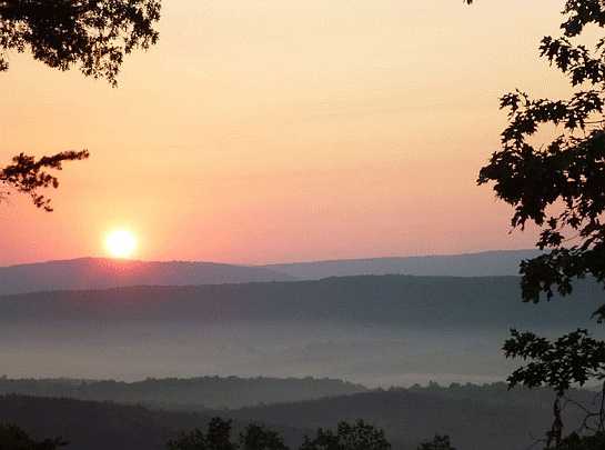 Purusha-Capital-1.jpg - Sun rising over the beautiful Blue Ridge Mountains in West Virginia, USA, future home of Purusha. Maharishi desired a location with beautiful, expansive views so that when Purusha looked out to Nature they would ?see bliss?.